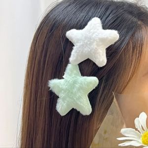 2 fuzzy hair clips 🩵🤍